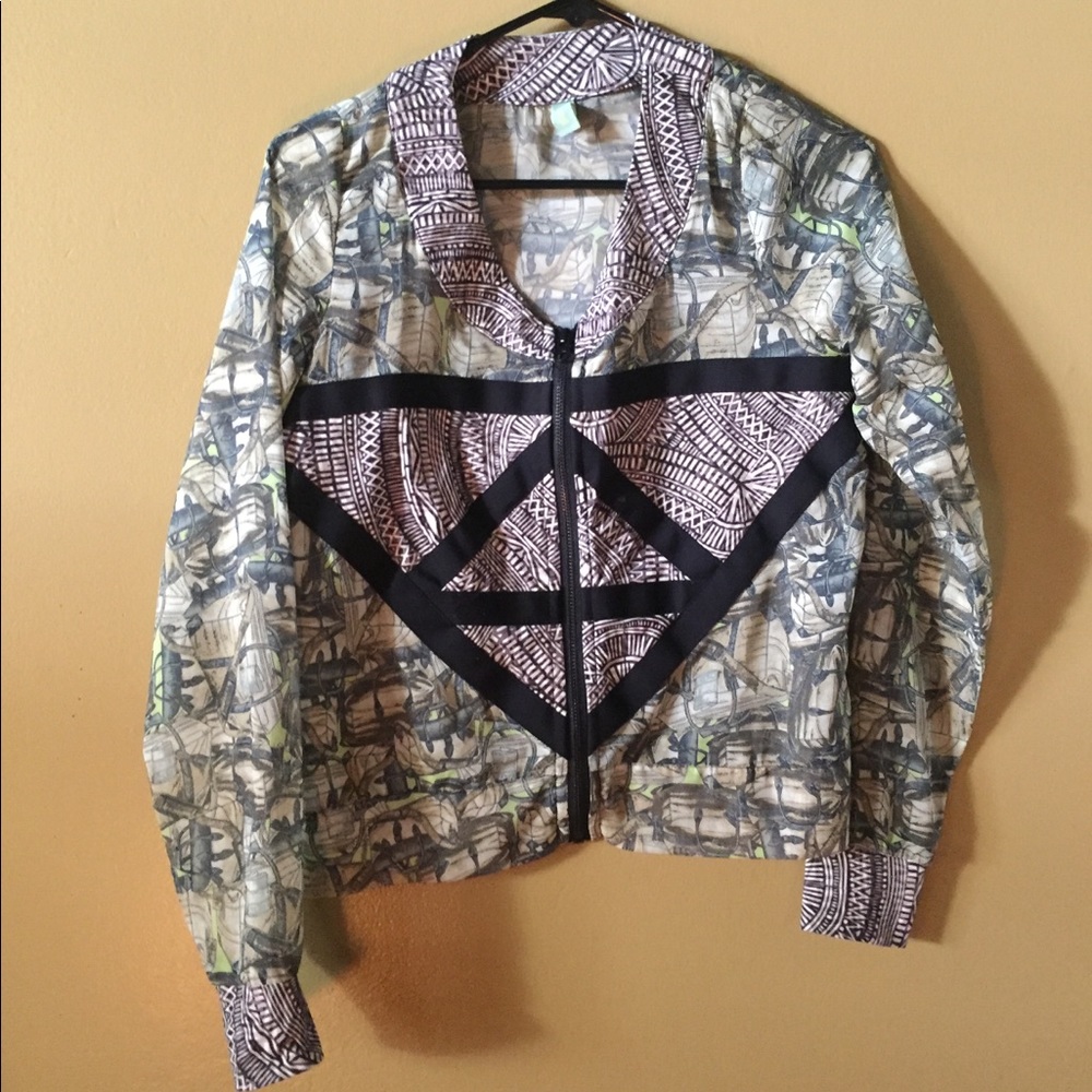 Maaji Sheer zip up jacket with “camo” details.